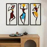 Bohemian Macrame Wall Hanging with African dancers in red, blue, and yellow outfits above a minimalist wooden cabinet. Handmade ethnic wall decor.