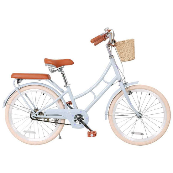 White bicycle with brown seat and basket on a white background