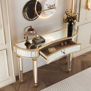 Half-Moon Mirrored Console Table with open drawer, showing storage space, styled with books and candle decor in a modern hallway.