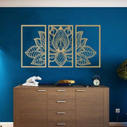 Iron Mandala Lotus Wall Art in 3-panel design displayed on a blue wall above a wooden cabinet, ideal for Zen-style luxury home decor.