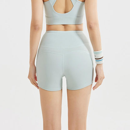 Back view of Yoga Shorts Tummy Control - High Waist in sky blue, showcasing seamless design and breathable material for daily workouts.