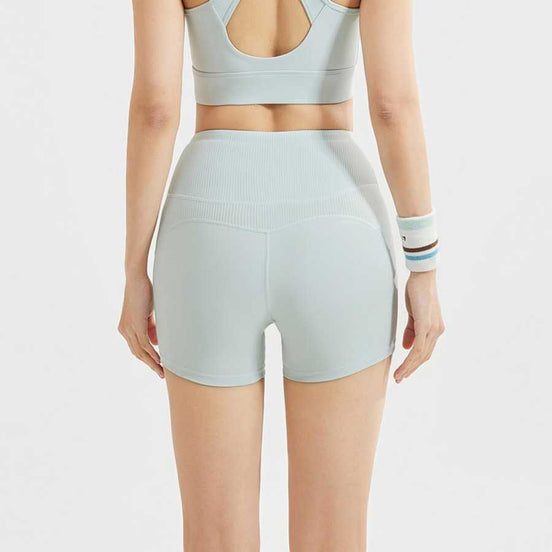 Back view of Yoga Shorts Tummy Control - High Waist in sky blue, showcasing seamless design and breathable material for daily workouts.