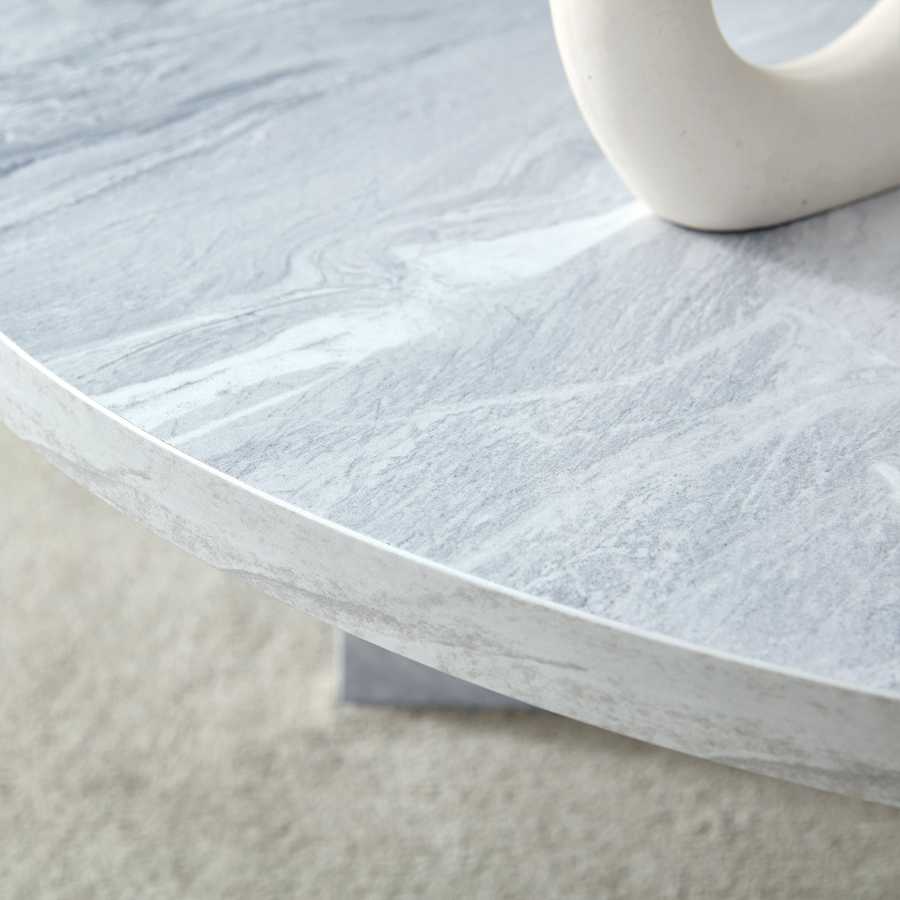 Edge detail of MDF white round coffee table with Nordic flair, showing smooth finish and realistic marble pattern.
