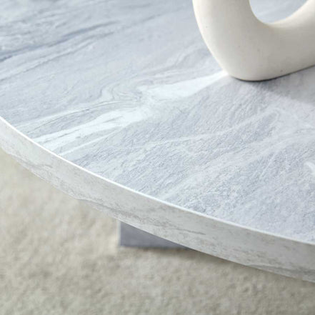 Edge detail of MDF white round coffee table with Nordic flair, showing smooth finish and realistic marble pattern.