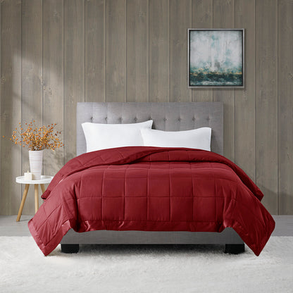 Down Alternative Blanket Burgundy Twin - Budget Comfort styled in a modern bedroom with gray headboard and white rug.