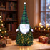 3 ft pre-lit tabletop Christmas tree gnome with green plaid hat on a wooden table