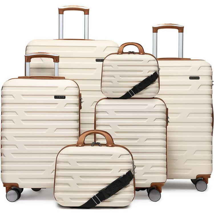 Set of cream-colored luggage with brown handles and wheels on a white background