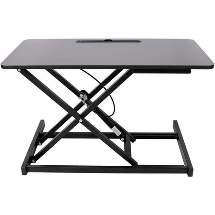 Side view of adjustable height laptop desk in raised position, showcasing sturdy metal frame and smooth desktop surface.