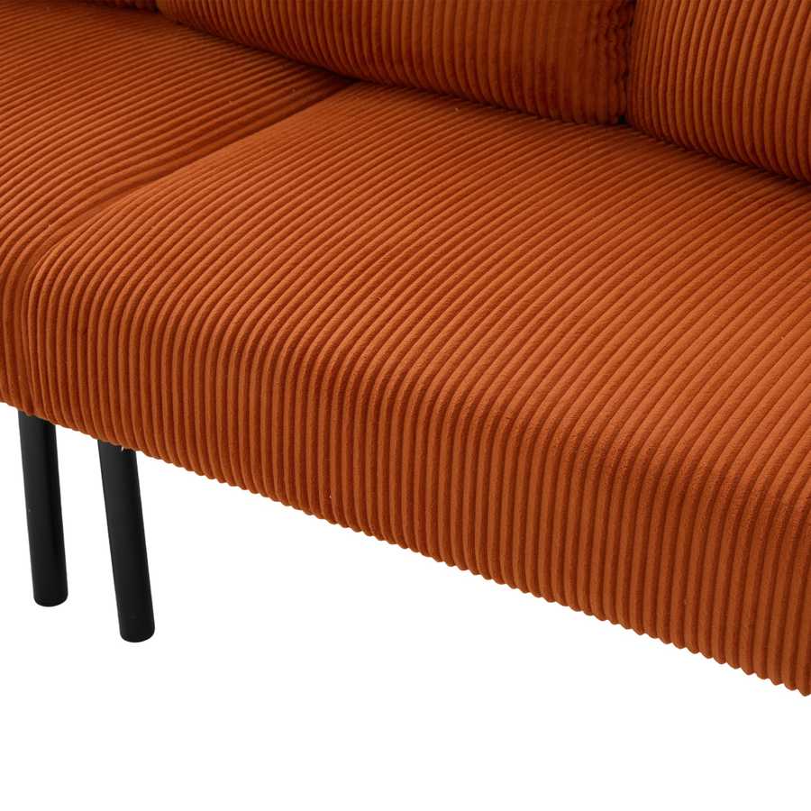 Close-up of a brown corduroy sofa with black legs on a white background