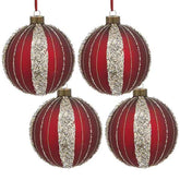 Four red and silver striped Christmas ornaments on a white background