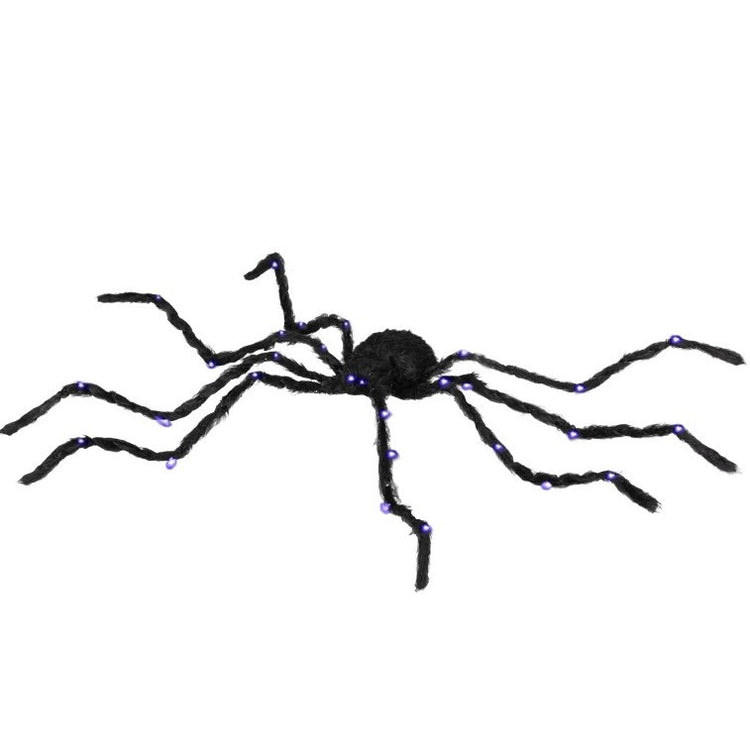Decorative spider with LED lights on a white background
