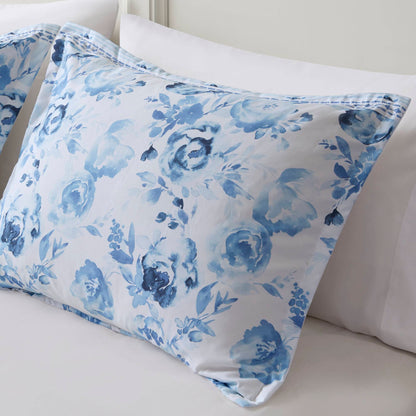 Close-up of floral pillow sham from the Twin Floral Striped Duvet Cover Set - Twin Duvet Cover Set Floral, featuring soft blue watercolor roses.