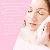 A close-up of a woman with closed eyes holding a white towel to her face, with pink text overlays on the left describing skincare benefits such as correcting dark spots, reducing acne, and improving skin texture.