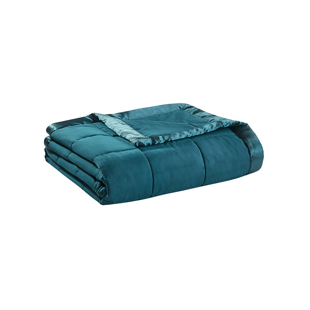 Folded Teal Twin Down Alternative Blanket with satin trim, showcasing plush texture and elegant finish for bedding collections.
