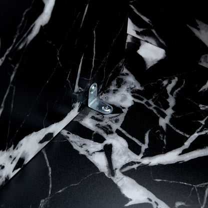 Interior bracket of black MDF round coffee table with modern minimalism, showing secure metal hardware for stability.