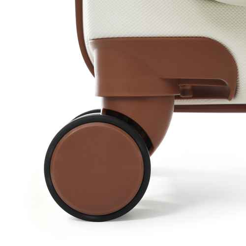 Close-up of a wheeled chair or stool leg, showing a brown plastic base and wheel with a black outer rim, next to a cream-colored textured seat cushion.
