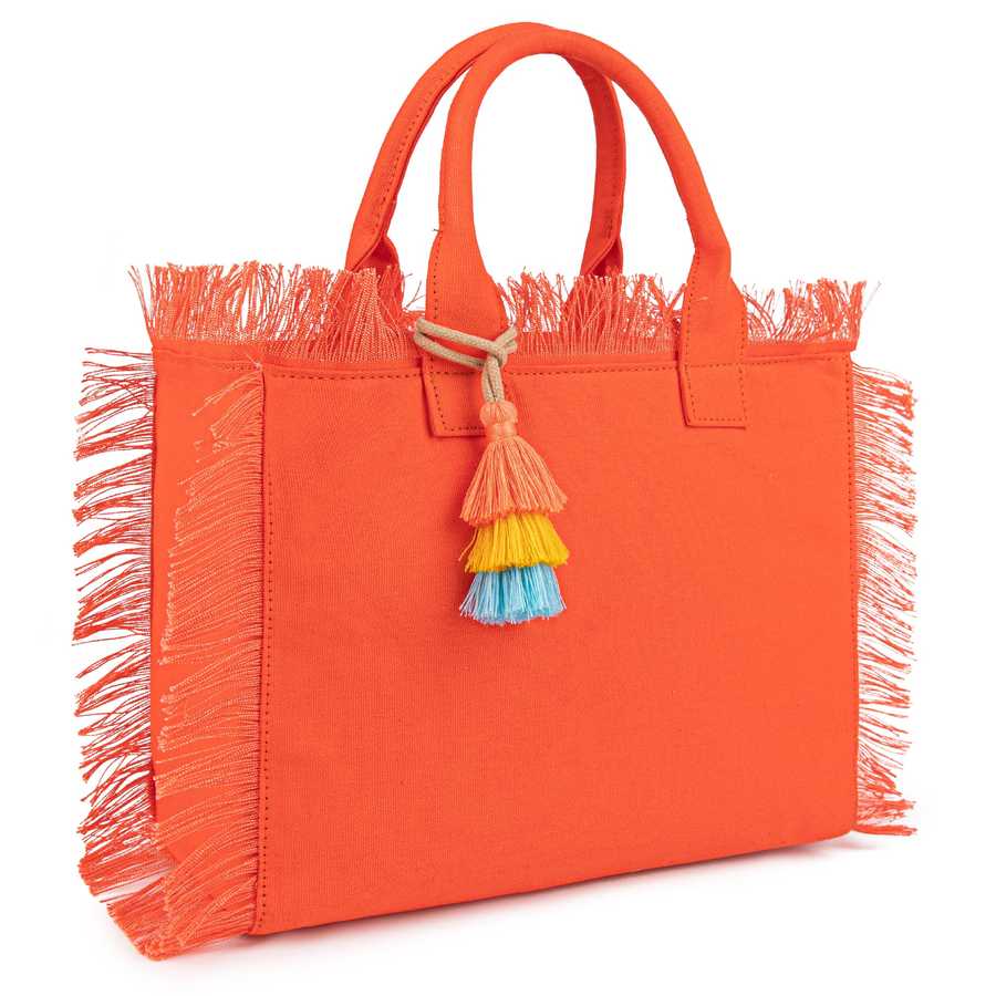 Orange tote bag with fringe details and colorful tassel on a white background