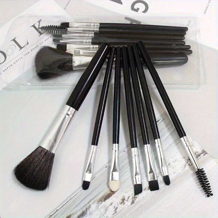 Makeup Brush Set - Essential Beauty Tools| Facial & Eye black cosmetic brushes with silver ferrules displayed on a magazine layout for beauty lovers.