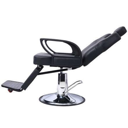Side view of reclining Barber Chair - Heavy Duty Hydraulic with chrome base and adjustable footrest for salon use