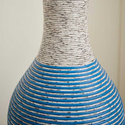 Close-up of the 39-inch floor vase decor showing its durable PVC texture with blue and white striped design. Perfect for stylish home accents.