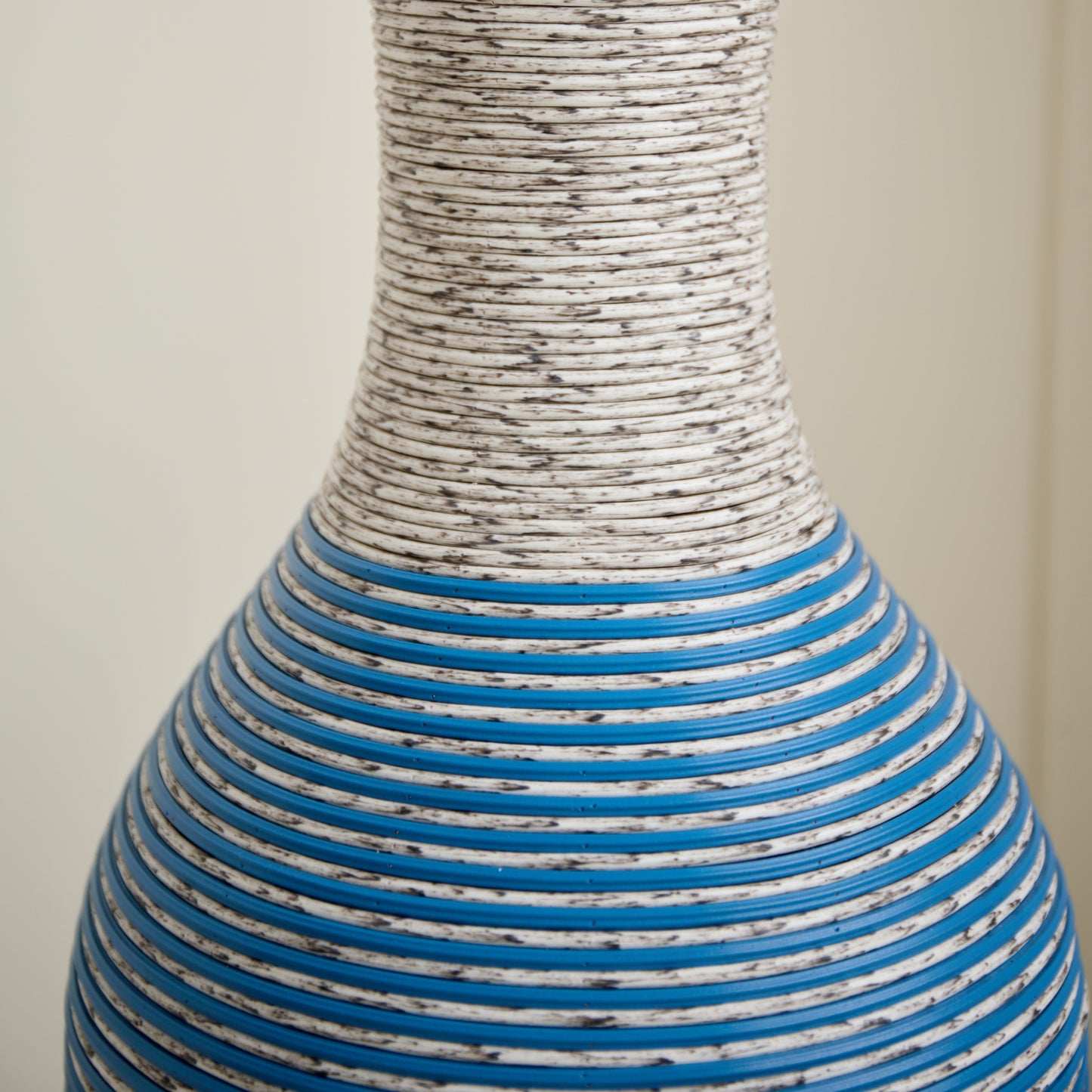 Close-up of the 39-inch floor vase decor showing its durable PVC texture with blue and white striped design. Perfect for stylish home accents.