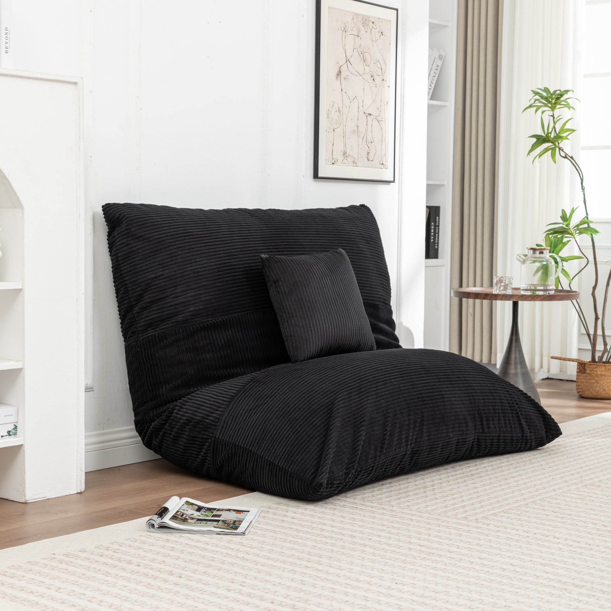 Corduroy Bean Bag Chair in black corduroy fabric, set up as a floor lounger with pillow, ideal for casual lounging.