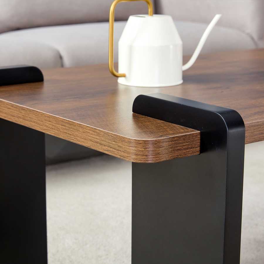 Corner detail of Walnut MDF Coffee Table with rounded edges and black metal legs, designed for modern minimalist interiors.