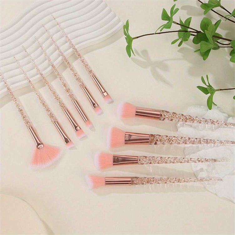 Complete Pink Crystal Makeup Brush Set arranged on a soft surface, showcasing durable glitter handles and plush pink bristles.