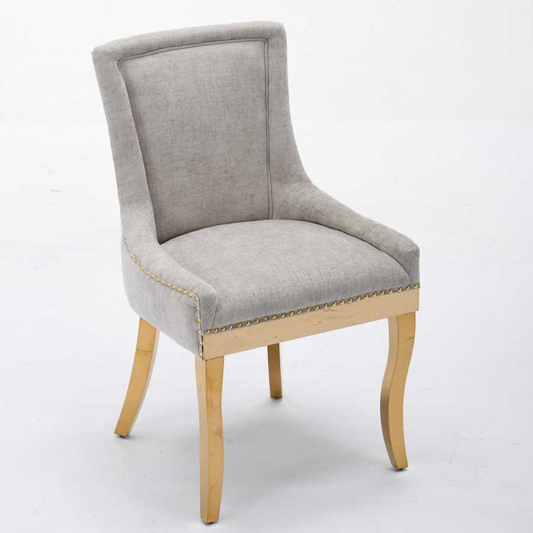 Gray upholstered chair with wooden legs on a white background