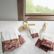 6 Piece Jacquard Towel Set in burgundy with paisley border, displayed in an elegant bathroom setting. Made of 100% cotton and machine washable.