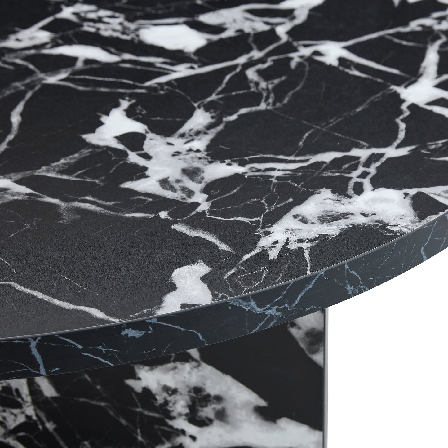 Close-up of black MDF round coffee table top with white marble veining, showcasing its luxurious and modern finish.
