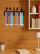 Metal rabbit garden stake wall sculpture with soccer players and medals