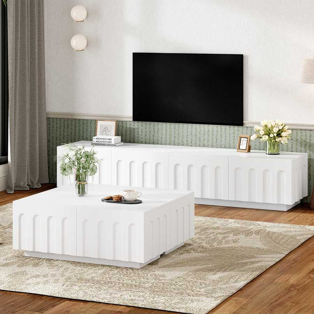 Modern TV Stand and Coffee Table Set with Hidden Storage in white finish, placed in a cozy living room with wall-mounted TV and floral decor.