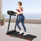 Woman running on treadmill in a bright room with wooden floor
