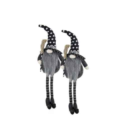 Set of two black gnome Halloween decor with polka dot hats, long striped legs, gray beards, and plush bodies, ideal for festive home accents.