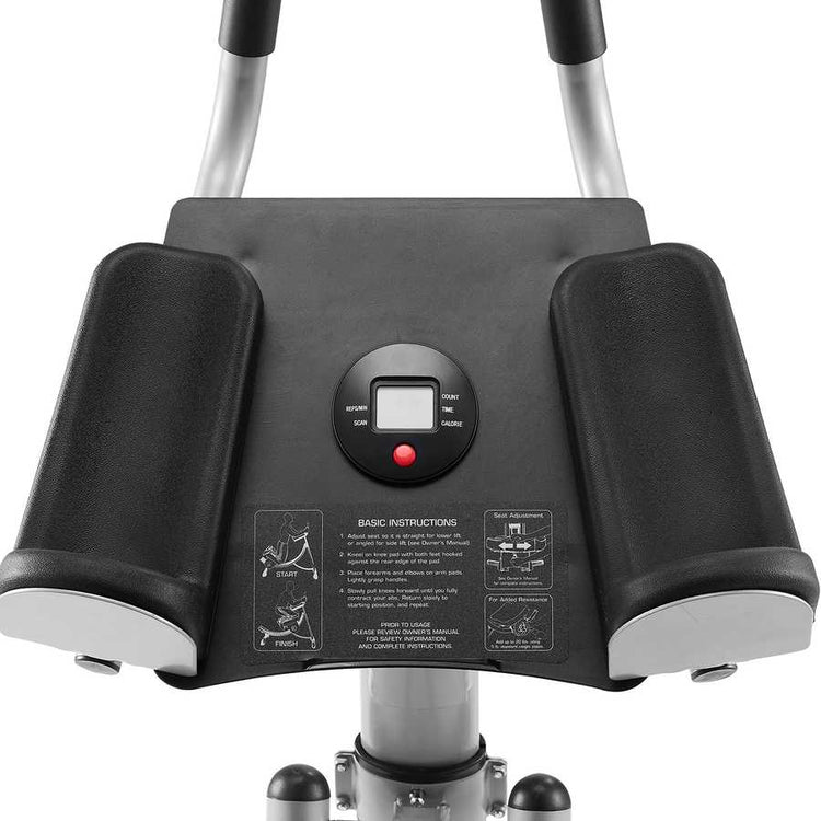 Close-up of a black and silver exercise device with control panel on a white background