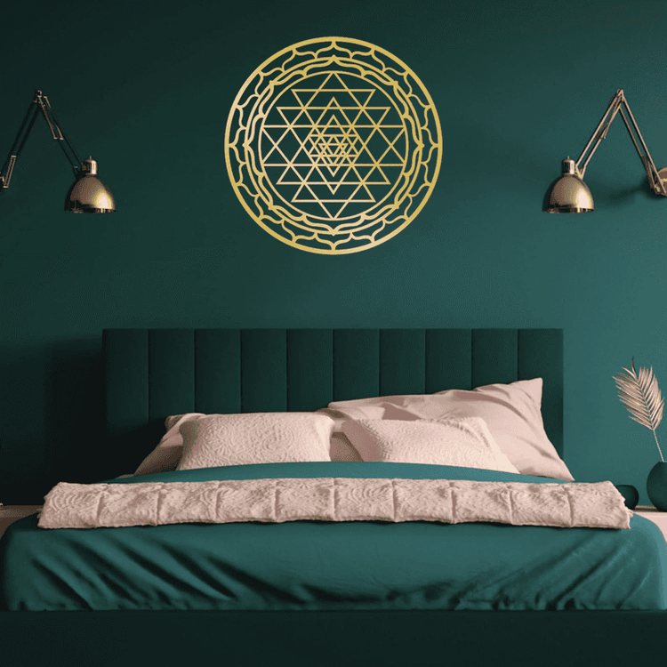 CIFbuy Sacred Mandala Wall Art in gold aluminum above a teal bed in a dark green room. A bold spiritual accent for bedroom walls.