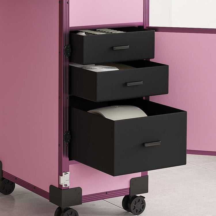 Pink nail art case with lockable drawers and 360-degree rotating wheels