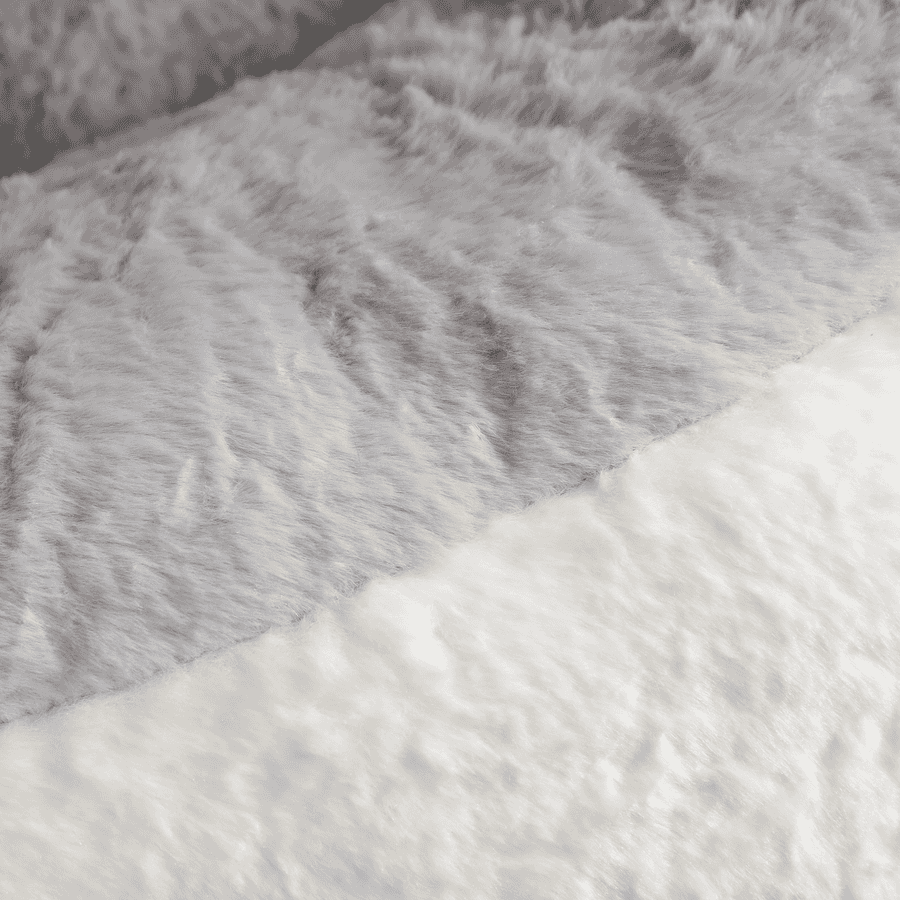 Close-up of gray and white fur fabric texture