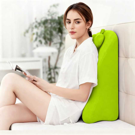 Ergonomic Spinal Posture Support Pillow - Memory Foam used by woman reading on sofa, offering upright back support and posture alignment.