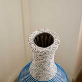 Top view of 39-inch floor vase decor showcasing its narrow opening and detailed PVC craftsmanship. Great for dried floral arrangements.