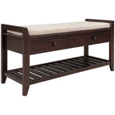 Wooden bench with a cushioned seat and storage drawer on a white background