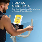 Man using exercise bike with digital device displaying sports data on a blue background