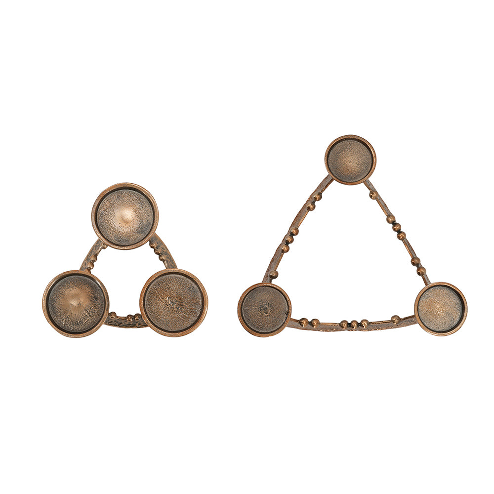 Two bronze-toned triangular jewelry pieces with circular medallion details, displayed side by side on a plain white background.