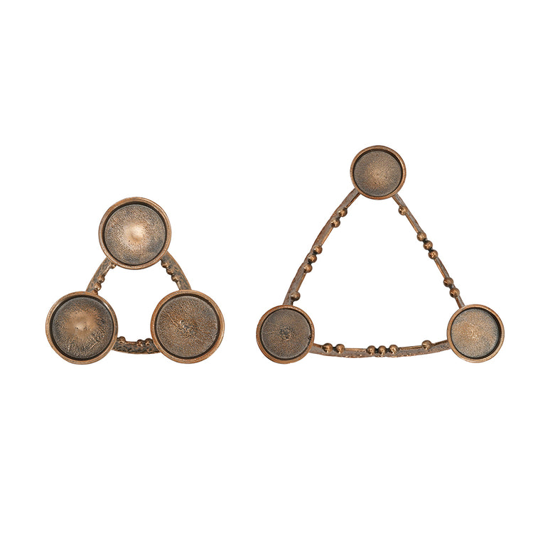 Two bronze-toned triangular jewelry pieces with circular medallion details, displayed side by side on a plain white background.