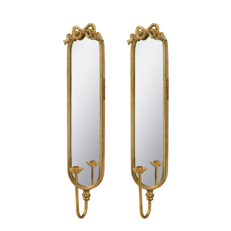 A pair of tall, narrow wall mirrors with ornate gold frames and decorative scrollwork at the top, shown against a plain white background.
