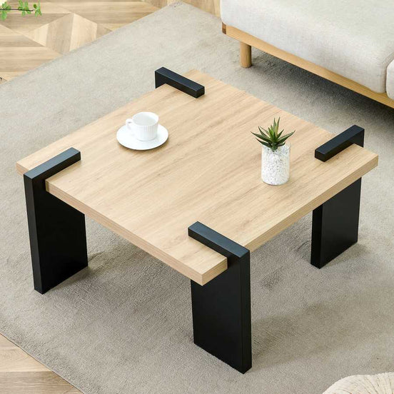 Modern MDF Coffee Table with minimalist design, shown in a living room setup with decor, perfect for stylish and functional interiors.