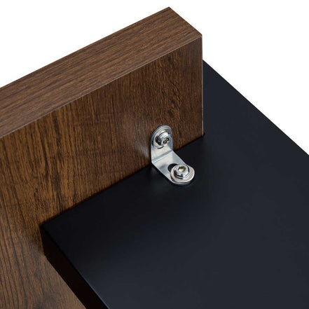 Metal bracket securing leg to tabletop on Modern Walnut Coffee Table - MDF Style, emphasizing structural integrity.