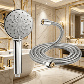 Chrome shower head and flexible hose with a bathroom setting in the background