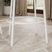 Close-up of sturdy white metal legs and circular footrest of 3-piece bar table set, offering strong support and modern design.